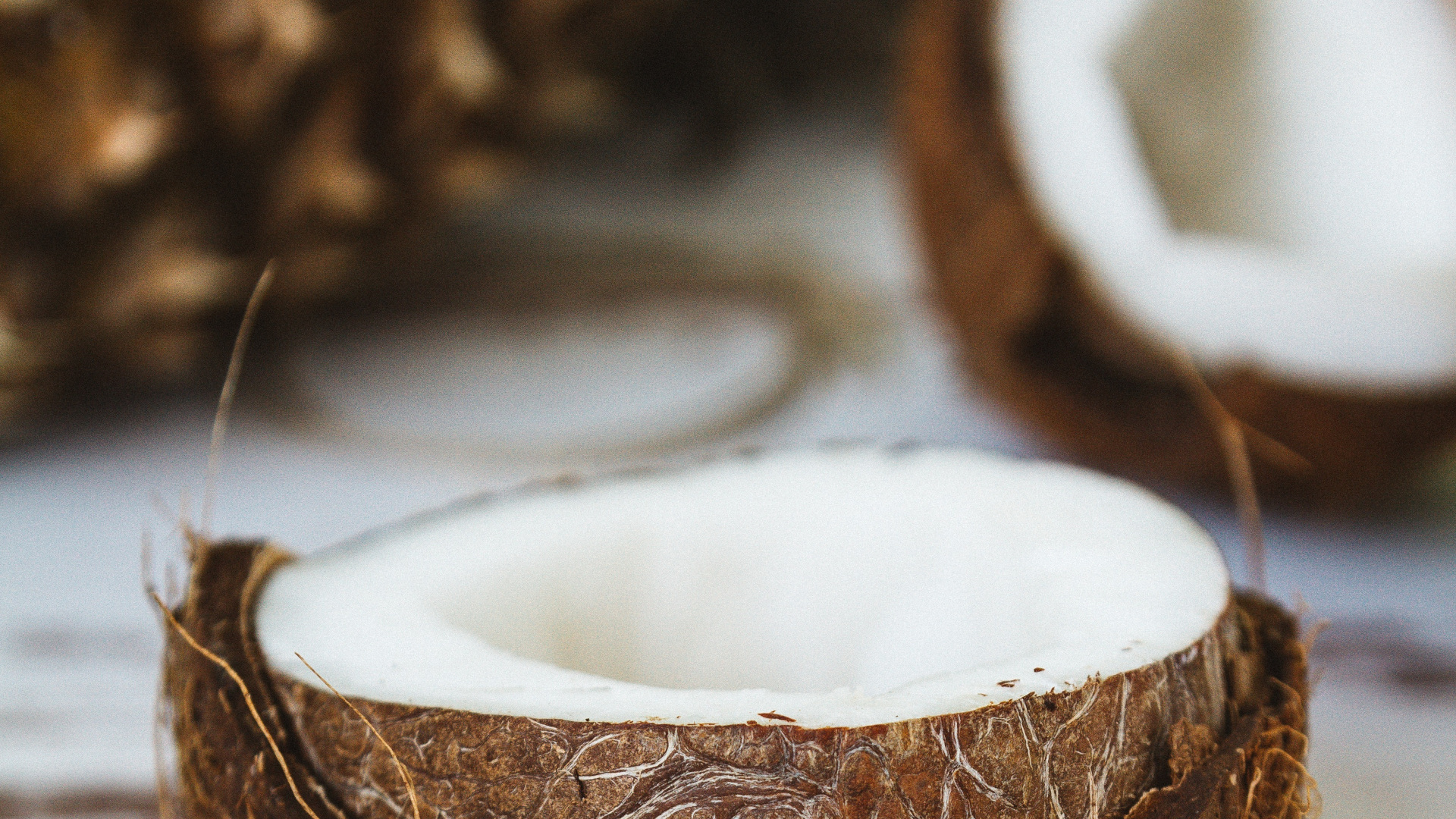 Whole Opened Coconut used to make Coconut Carrier Oil